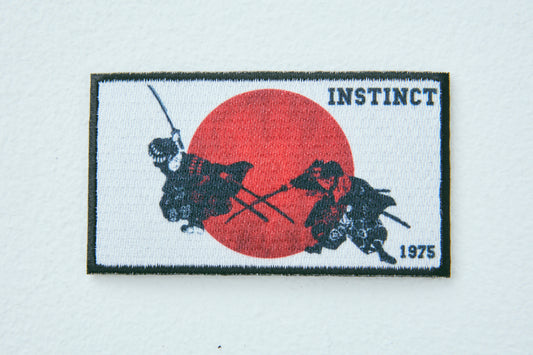 "Instinct" Emblem Wappen